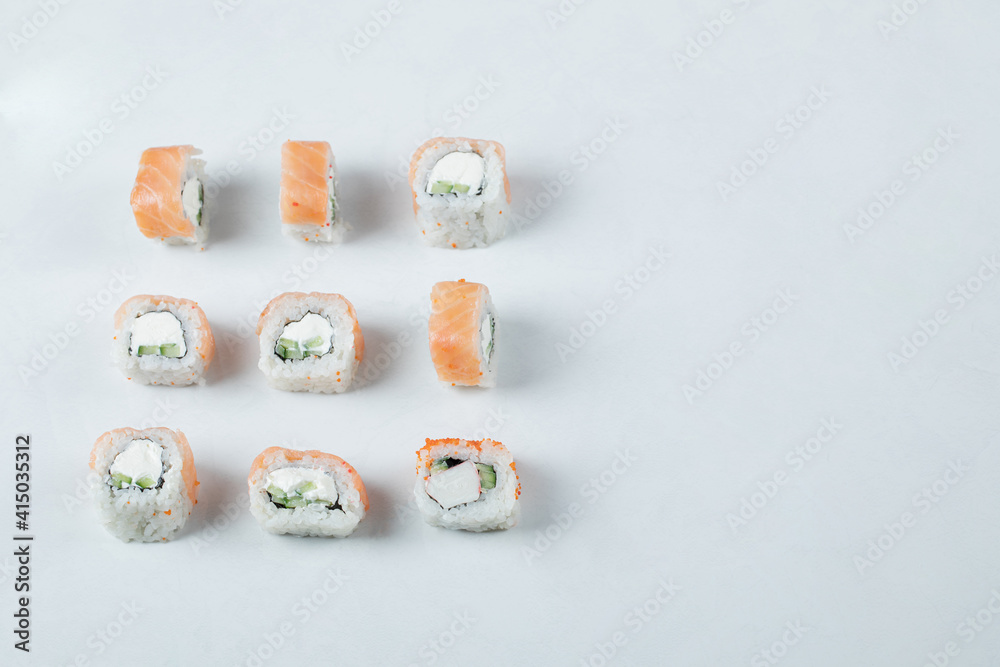 Mini sushi rolls with red caviar and cream cheese Mini sushi rolls with red caviar and cream cheese