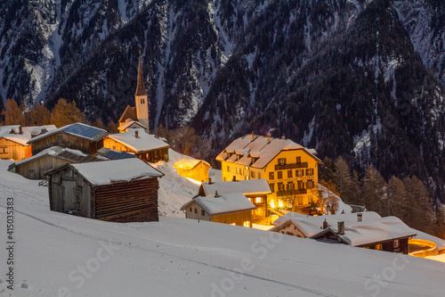 alpine village in a winter night