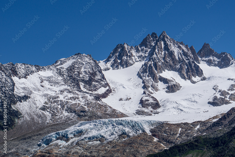 Obraz premium The alps and the nature of mont blanc seen during a beautiful summer day near the village of Chamonix, France - August 2020.