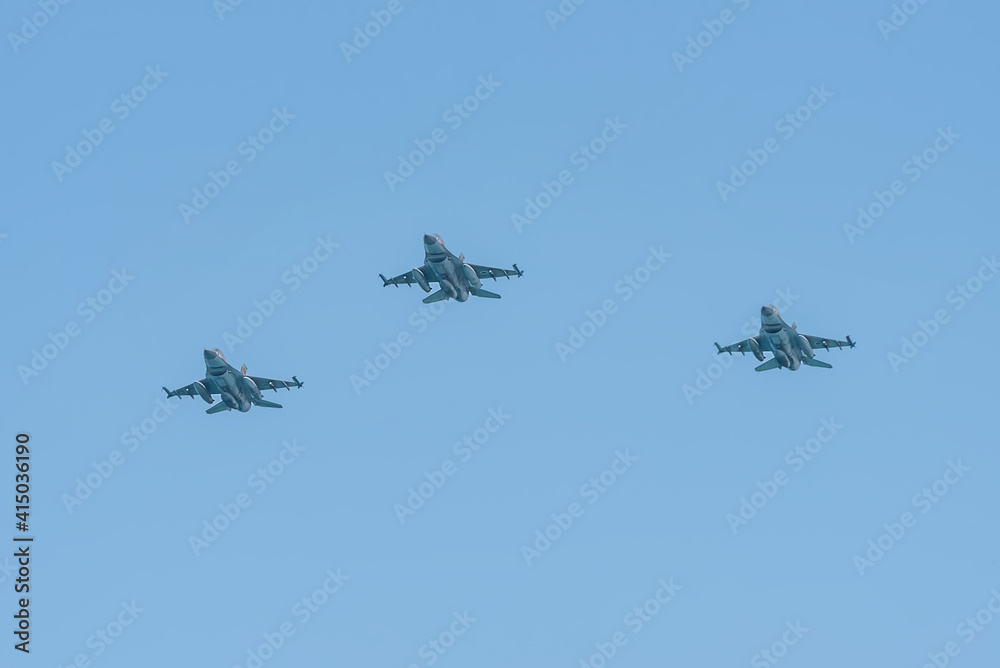 Three military aircraft. Independence Day in Israel, a national holiday. Israel Air Force show in the sky in Tel Aviv Three military aircraft. Independence Day in Israel, a national holiday. Israel Air Force show in the sky in Tel Aviv