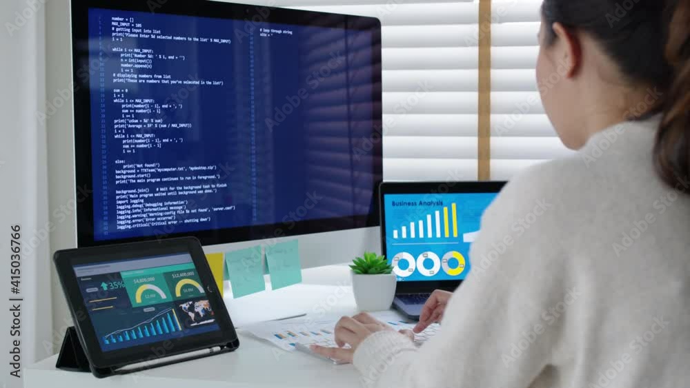 Back rear view of young asian woman, freelance data scientist work remotely at home coding programing on Big data mining, AI data engineering, IT Technician Works on Artificial Intelligence Project.