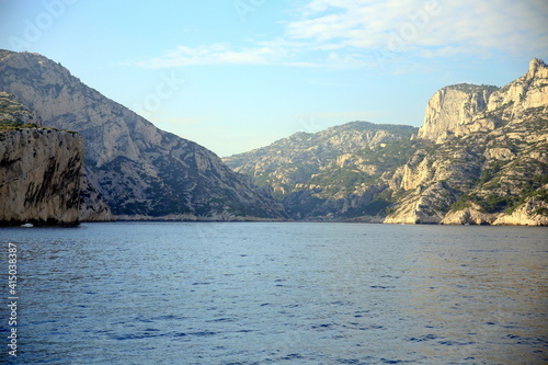 Creek with cliffs at sunset, between lights and shadows, Parc National des Calanques, Marseille, France