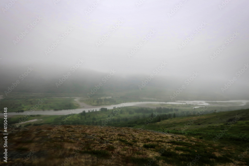 Sob River misty view near Sob station by summer, Yamalo-Nenets Autonomous Region, Russia