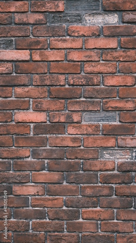 old brick wall with some missing bricks