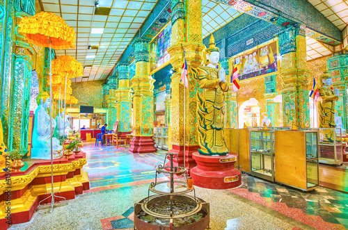 The shrine's interior with beautiful decorations, Mandalay, Myanmar photo