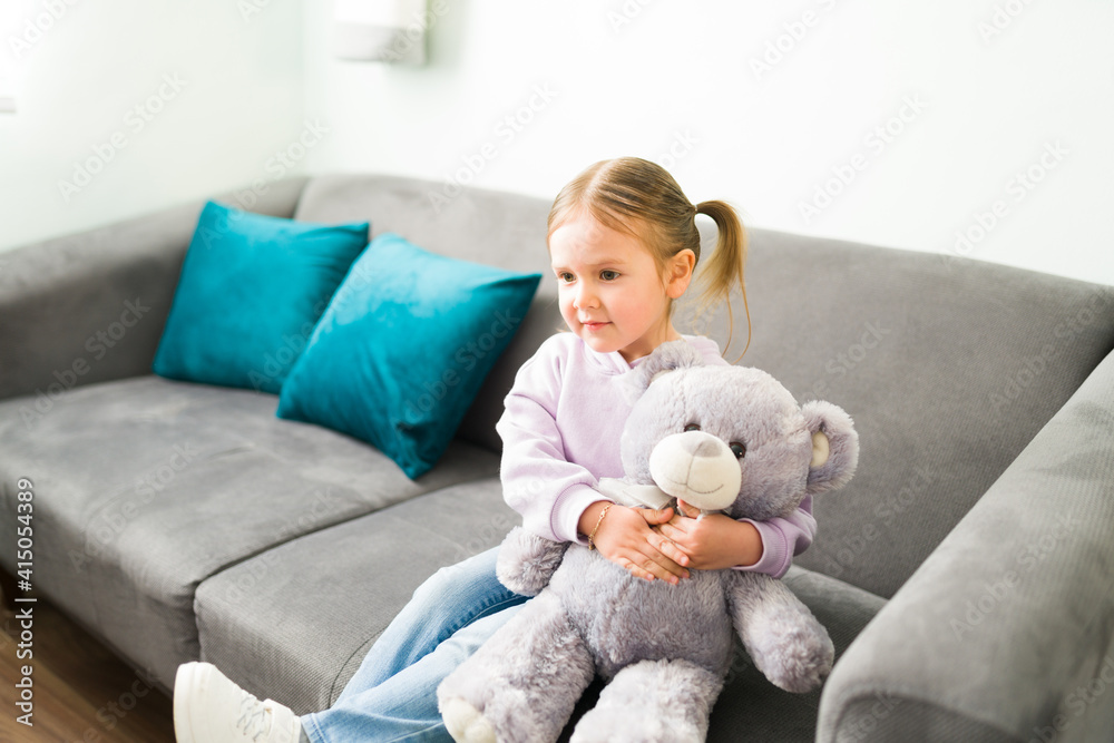 Preschool girl waiting for her child therapy to start