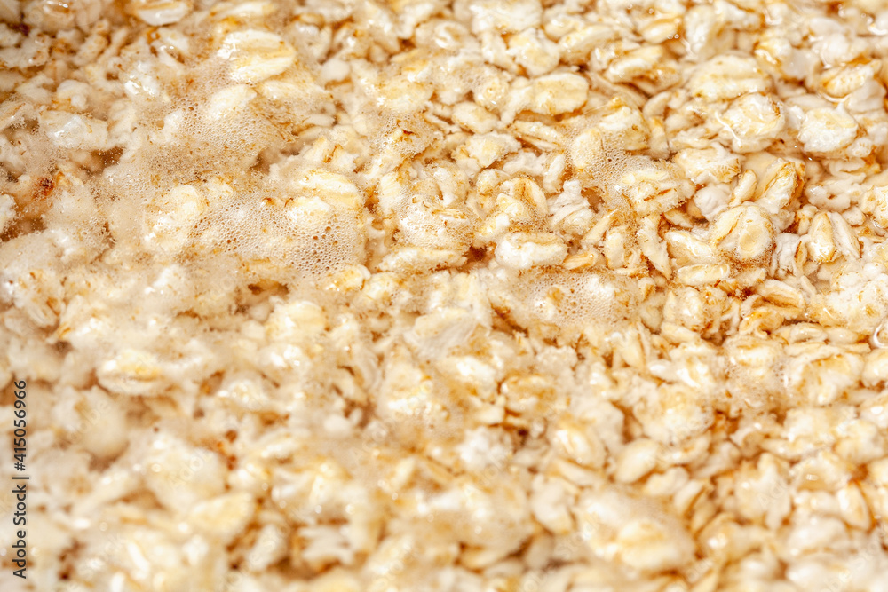 Oatmeal boiling , cereals preparation for breakfast Oatmeal boiling , cereals preparation for breakfast