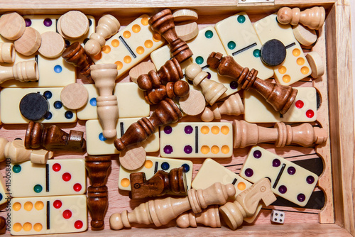 A variety of board game pieces. A background miscellaneous board game pieces