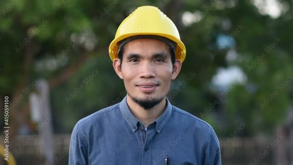 Portrait Asian man wear hard hat Worker smile Portrait Asian man wear hard hat Worker smile