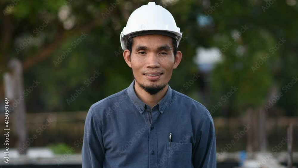 Portrait Asian man wear hard hat Worker smile Portrait Asian man wear hard hat Worker smile