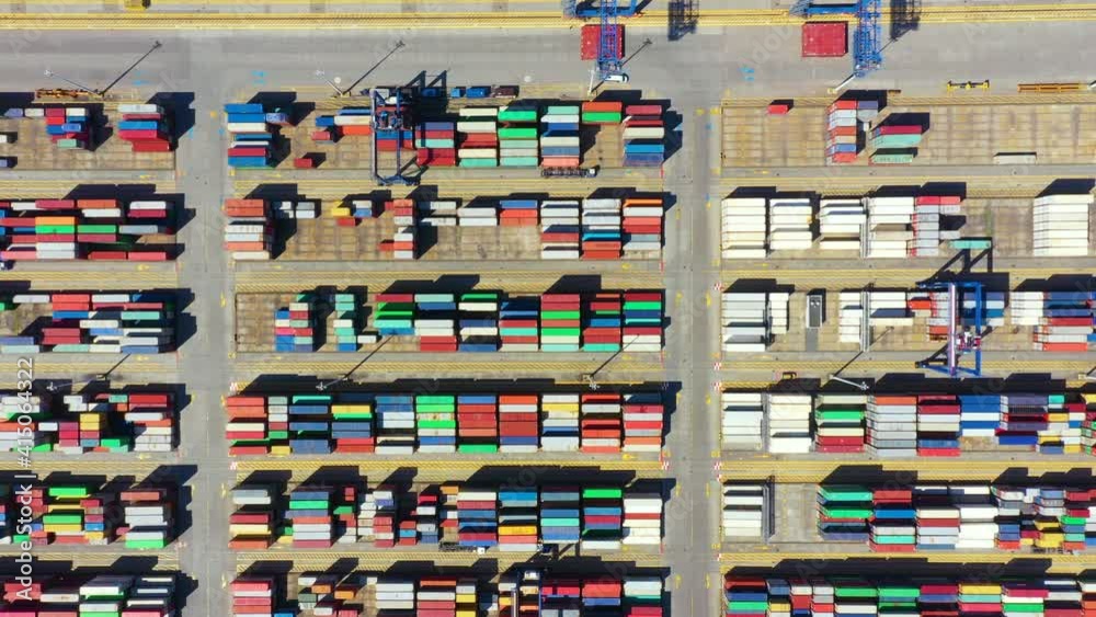 Container ship in export and import business and logistics. Shipping cargo to harbor by crane. Water transport International. Aerial view and top view. Container ship in export and import business and logistics. Shipping cargo to harbor by crane. Water transport International. Aerial view and top view.