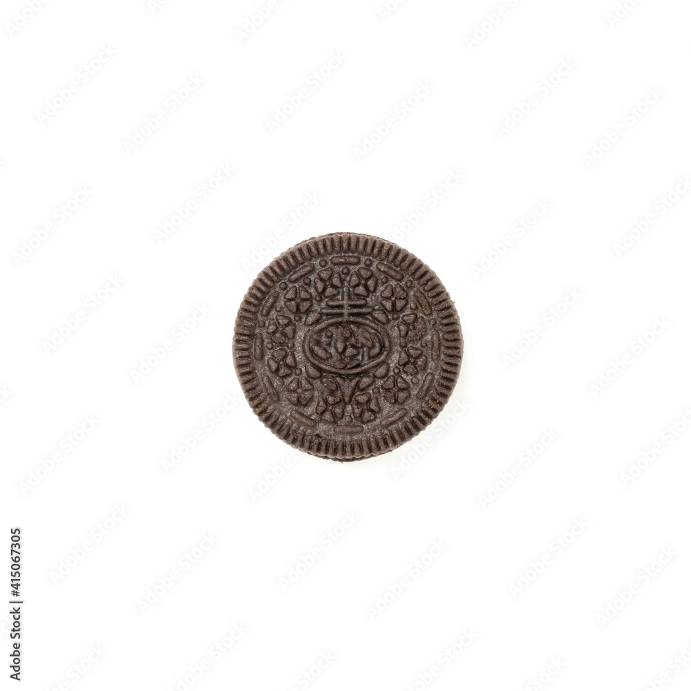 Biscuits chocolate with crumbs on white background. It is a chocolate cookies with a sweet cream. Biscuits chocolate with crumbs on white background. It is a chocolate cookies with a sweet cream.