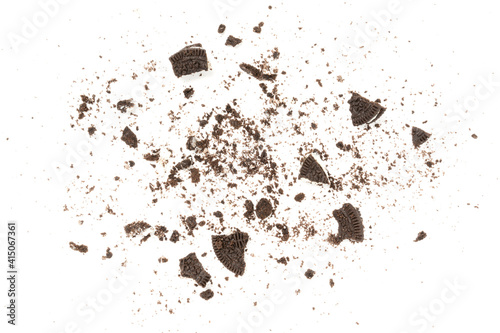 Biscuits chocolate  with crumbs on white background. It is a chocolate cookies with a sweet cream.