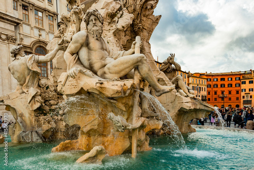 Italy, Rome. Piazza Navona, Fountain of the Four Rivers (Fontana dei Quattro Fiumi), designed 1861 by Bernini, God of the Ganges River.