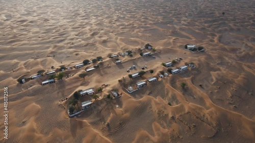 Aerial view of Abandoned Village of Madam also knows as Ghost town, Madam Desert town in Sharjah, United Arab Emirates. 4k Footage photo