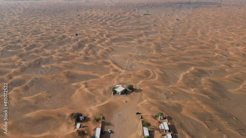 Aerial view of Abandoned Village of Madam also knows as Ghost town, Madam Desert town in Sharjah, United Arab Emirates. 4k Footage photo
