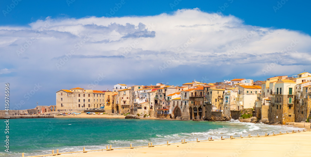 Italy, Sicily, Palermo Province, Cefalu. The beach on the Mediterranean Sea in the town of Cefalu.