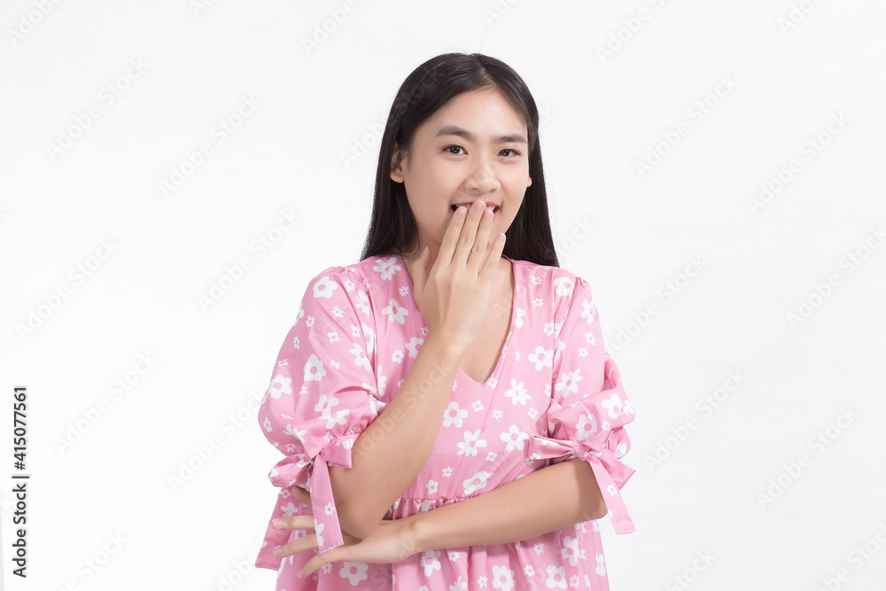 Cute Asian woman Pink dress Standing smile Close your mouth and look straight. Stand shyly on a white background Cute Asian woman Pink dress Standing smile Close your mouth and look straight. Stand shyly on a white background
