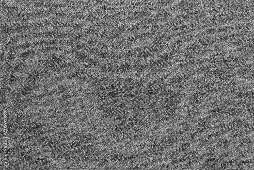 Gray tweed woven fabric textile background Gray tweed woven fabric textile background
