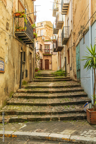 Italy, Sicily, Palermo Province, Castelbuono. Stairs on a narrow street in Castelbuono.