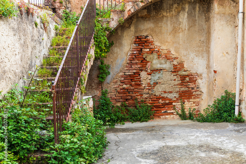 Italy, Sicily, Palermo Province, Castelbuono. Ruins a of staircase and wall Castelbuono. photo