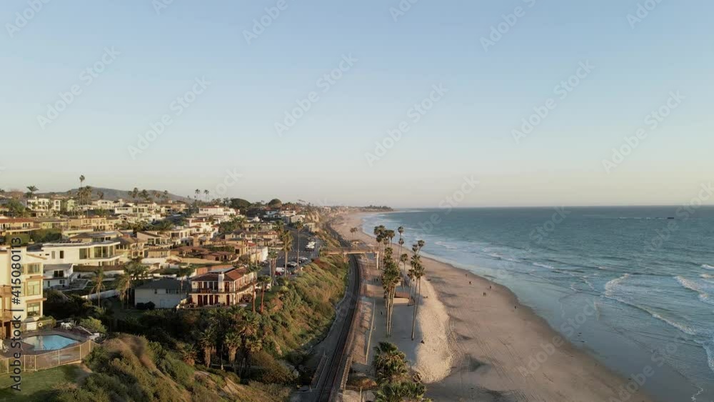 Aerial forward over San Clemente beach at sunset, California Aerial forward over San Clemente beach at sunset, California