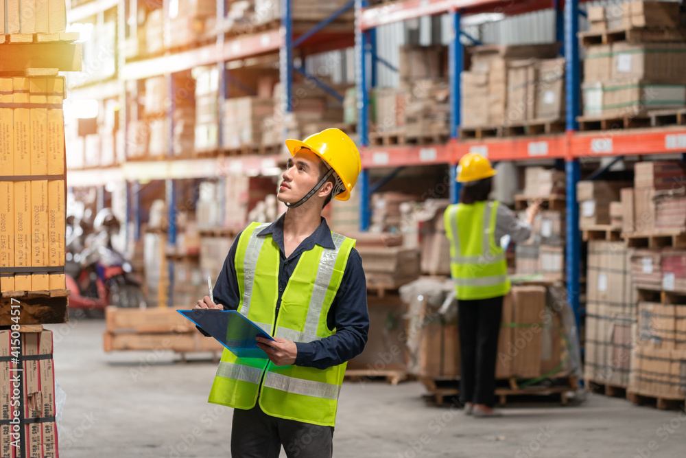 Warehouse worker working together in warehouse Warehouse worker working together in warehouse