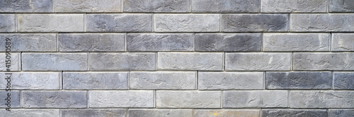 pattern of decorative gray slate stone wall surface as a background. banner