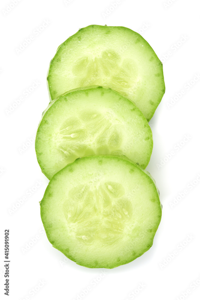 Slices of green cucumber on white background Slices of green cucumber on white background