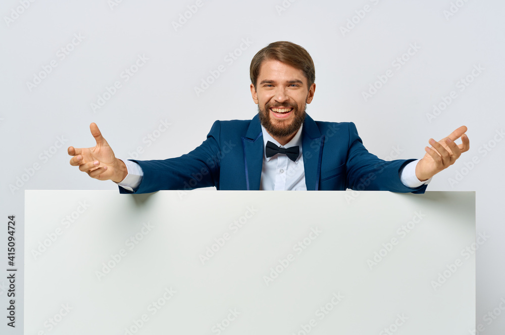 business man in suit bow tie presentation white banner close-up copy space business man in suit bow tie presentation white banner close-up copy space