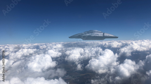 3D rendering- Ufo Flying Saucer hovering over Clouds, Metalic shape from plane point of view, Alien invasion concept