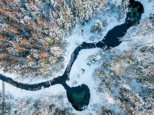 Siniallikad (Estonia) winter river in the forest photo