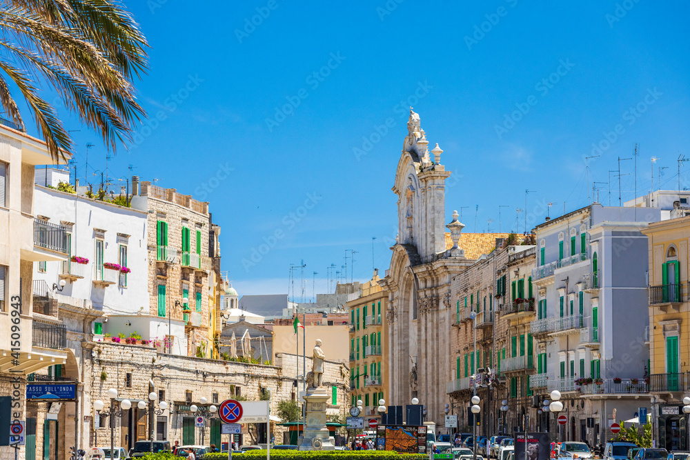 Italy, Apulia, Metropolitan City of Bari, Molfetta. Street scene of Via San Domenico and Church of St. Domenico.