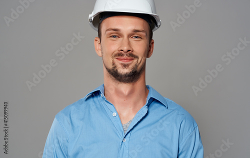 A business man with a helmet on his head Builder architect