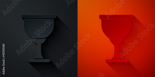 Paper cut Holy grail or chalice icon isolated on black and red background. Christian chalice. Christianity icon. Paper art style. Vector.