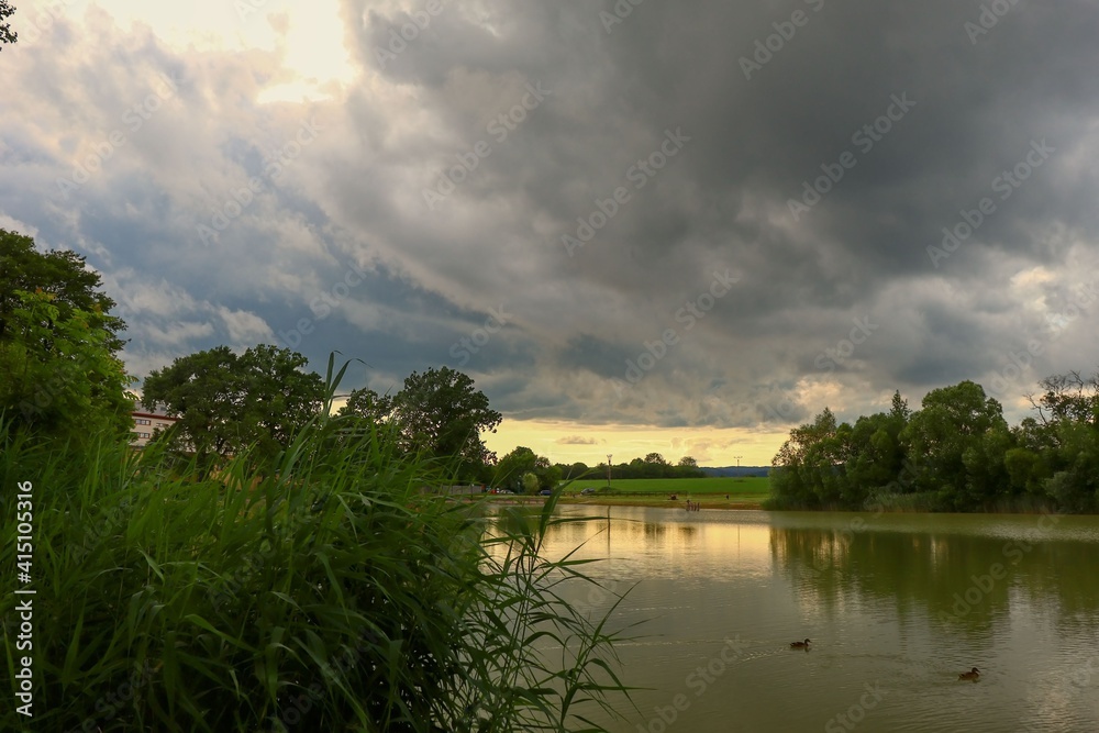 landscape with a lake and clouds
