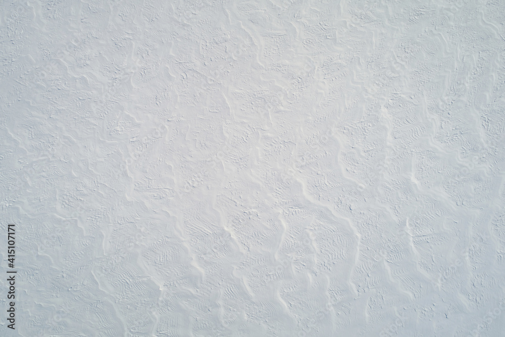 Fototapeta premium Pattern of snow field surface