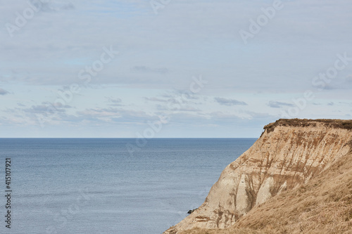 view of a cliff and the blue ocean