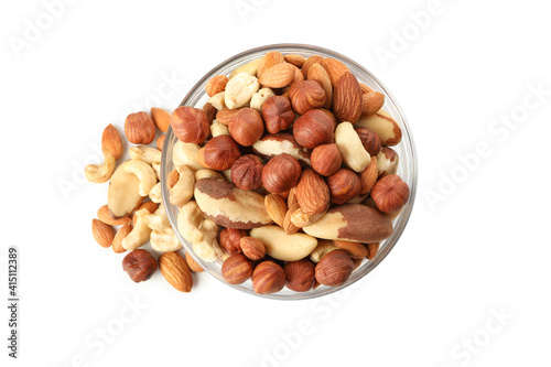 Bowl with different nuts isolated on white background