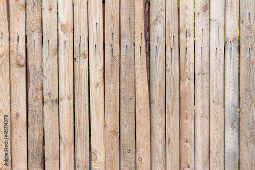 Wooden fence of waste boards