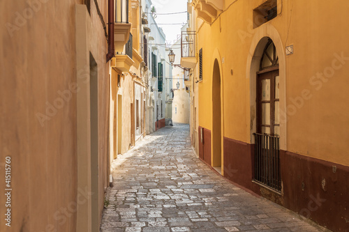 Italy  Apulia  Province of Lecce  Gallipoli. Narrow cobblestone street.