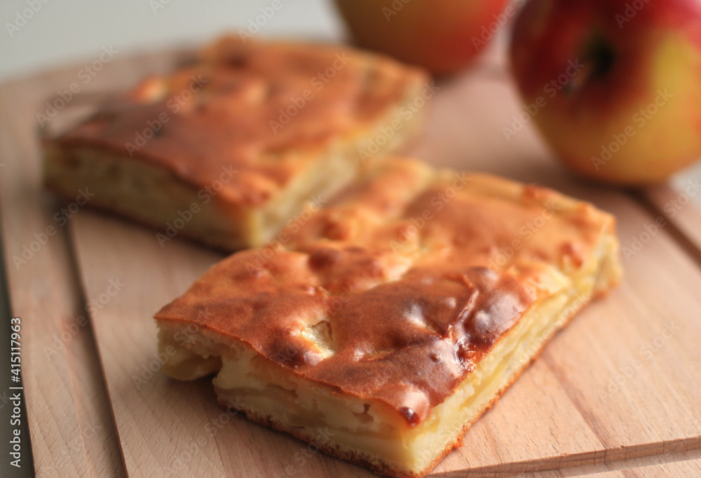 Simple delicious tender homemade apple pie with powdered sugar