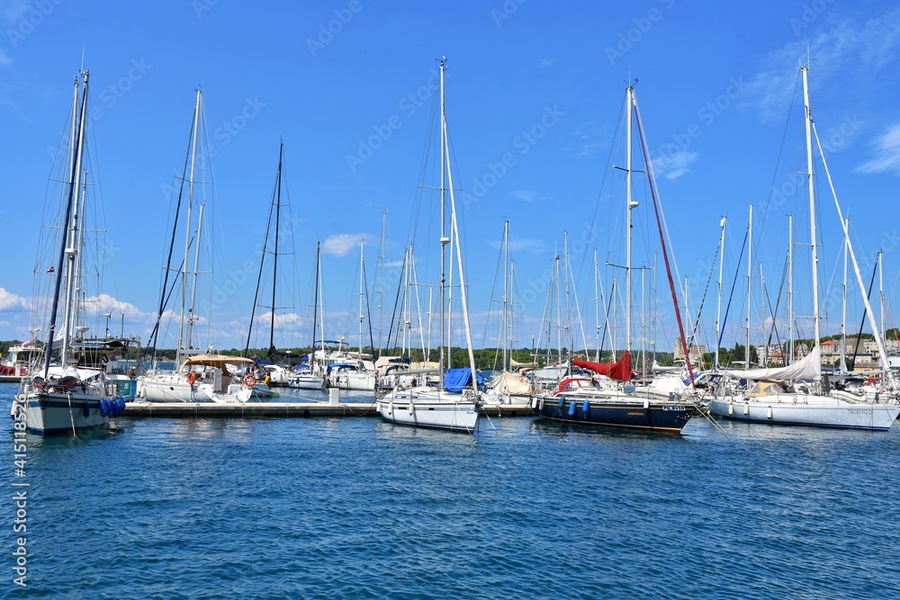 Pula, Croatia - August 2020: Adriatic sea harbour of Pula with docked ships Croatia, Europe. Marina with moored yachts