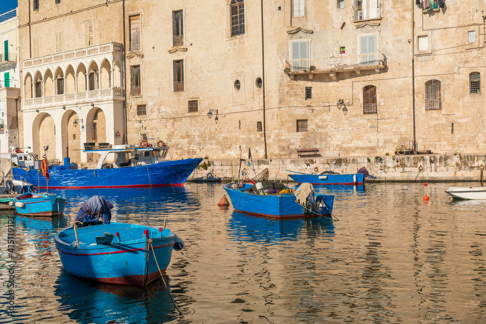 Italy, Apulia, Metropolitan City of Bari, Monopoli. Porto di Monopoli. Fishing boats tied up in the harbor.