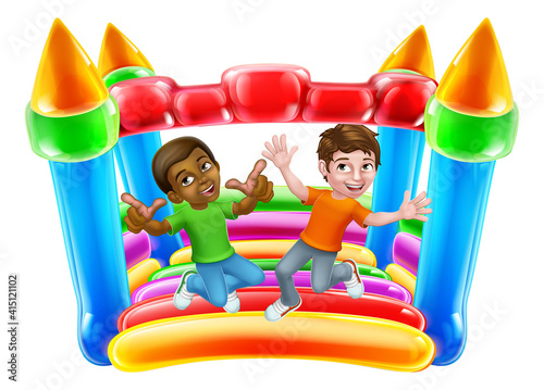 Children jumping and bouncing on a kids bouncy inflatable castle house