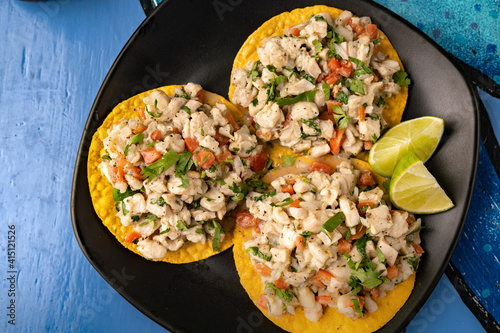 Mexican tortilla tostada with fresh ceviche seafood