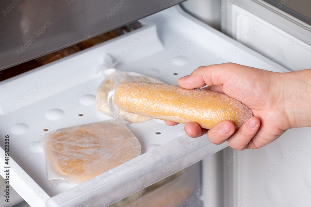 Frozen homemade dough in the freezer
