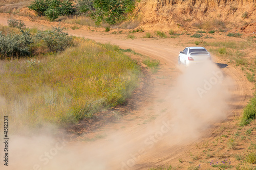 Sports Car on the Turn of the Rally Track and a Lot of Dust 03 © goodman_ekim