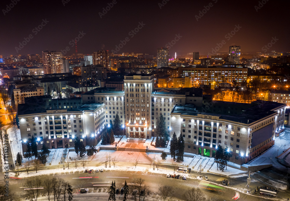 Aerial night winter view to Karazin National University at Svobody square in Kharkiv, Ukraine