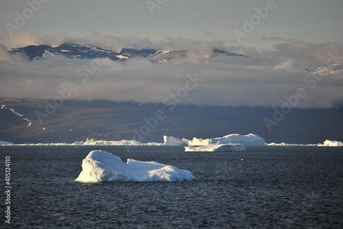 Greenland. Icebergs in the ocean. The nature of the North.